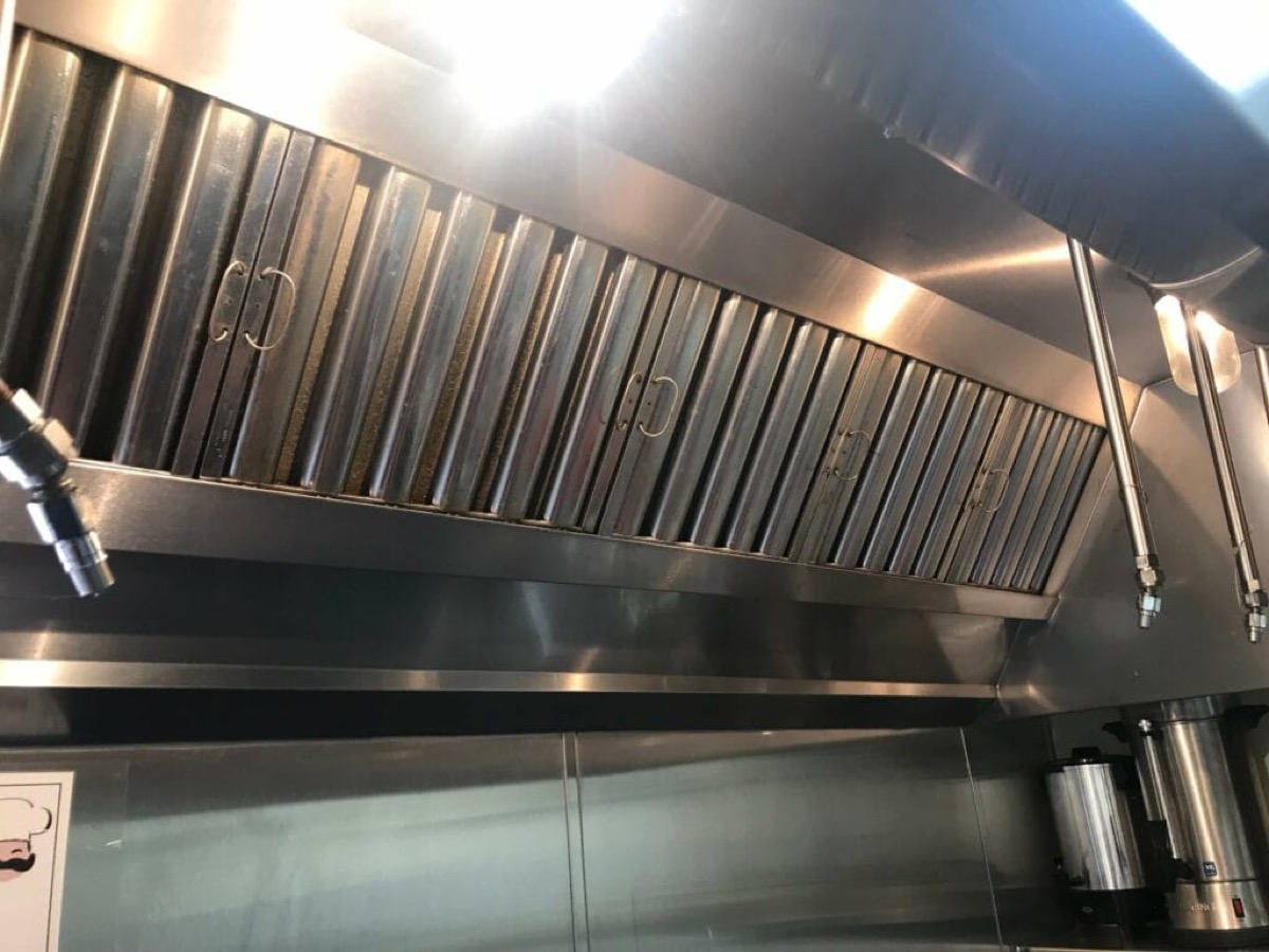 Commercial kitchen exhaust system being cleaned by ProClean